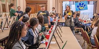 Provost Academy students participate in painting activity